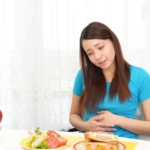 食欲不振の女性