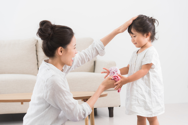 喜ぶママと子ども